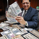 Rezwan Razack with some of the notes from his collection.